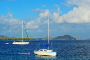 Private yacht rental Miami by Yacht Scarlet Charters luxury yacht cruising in open sea with scenic views